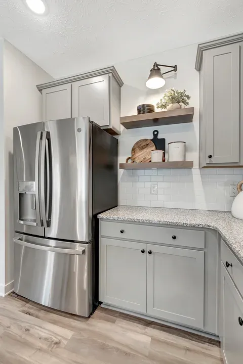 Kitchen with stylish floating shelves