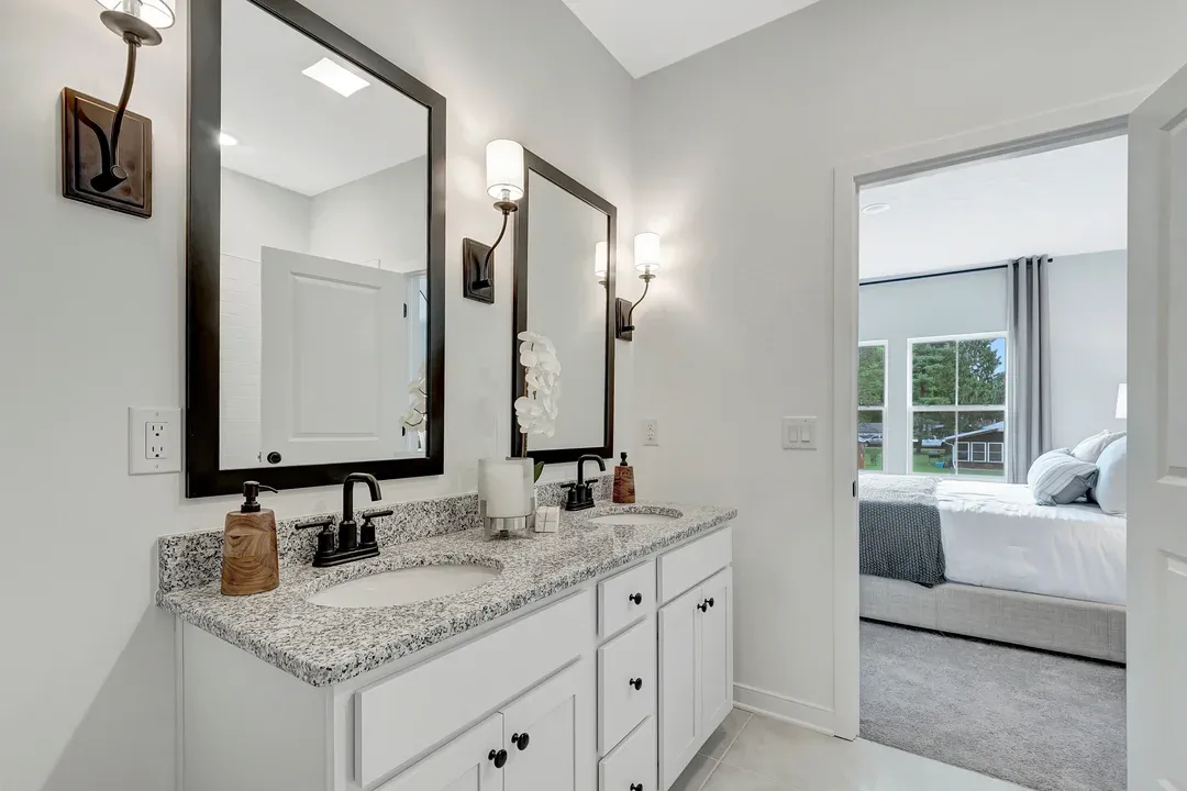 Private en suite primary bath with dual sinks for easy mornings