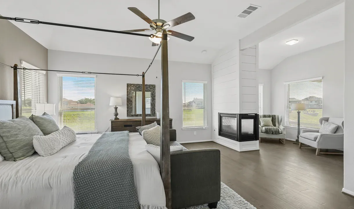 Owner's suite with sitting room through archway