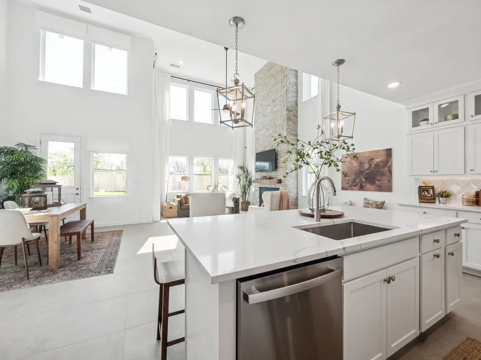Kitchen with spacious central island and pendant lighting