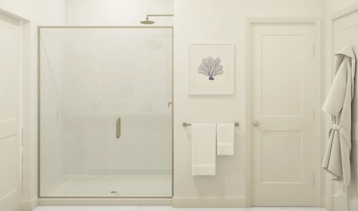 Primary bath with glass shower enclosure