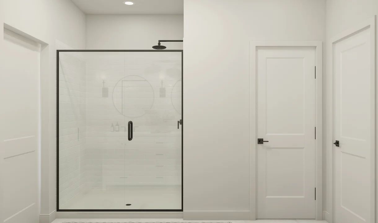 Primary bath with glass shower enclosure