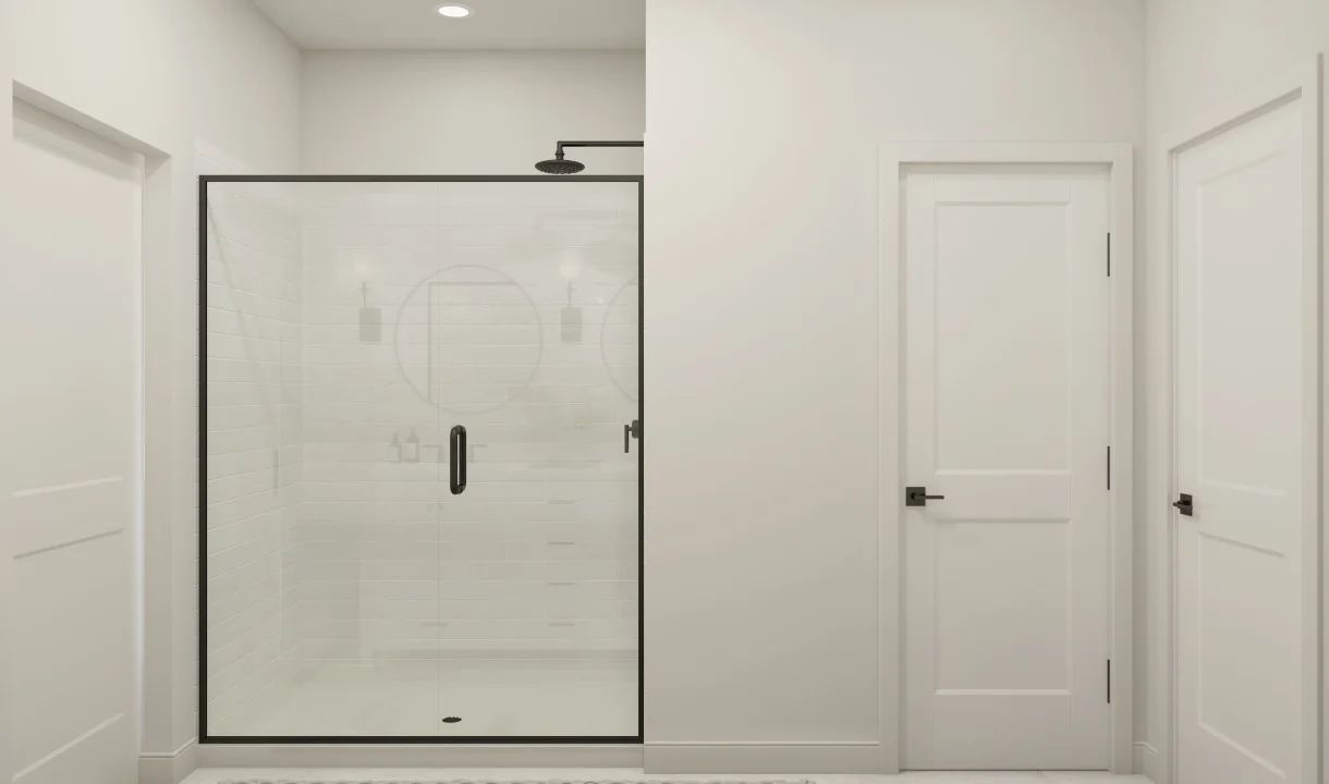 Primary bath with glass shower enclosure