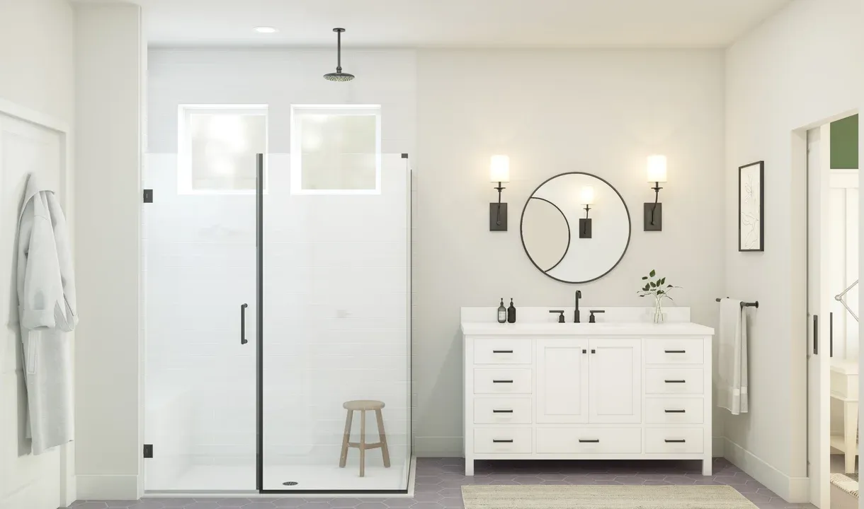 Primary bath with glass shower enclosure and matte black fixtures