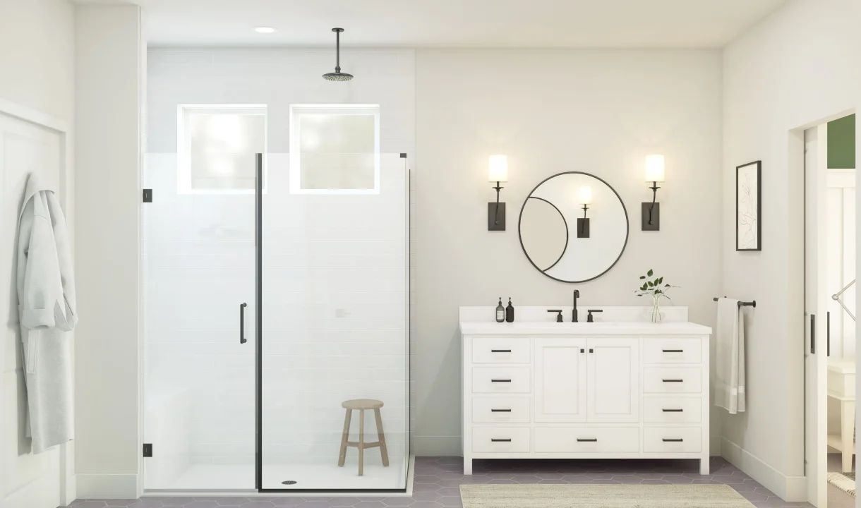 Primary bath with glass shower enclosure and matte black fixtures