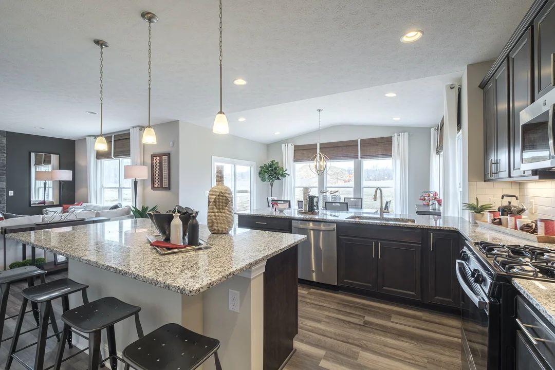 Kitchen with central island and peninsula counter