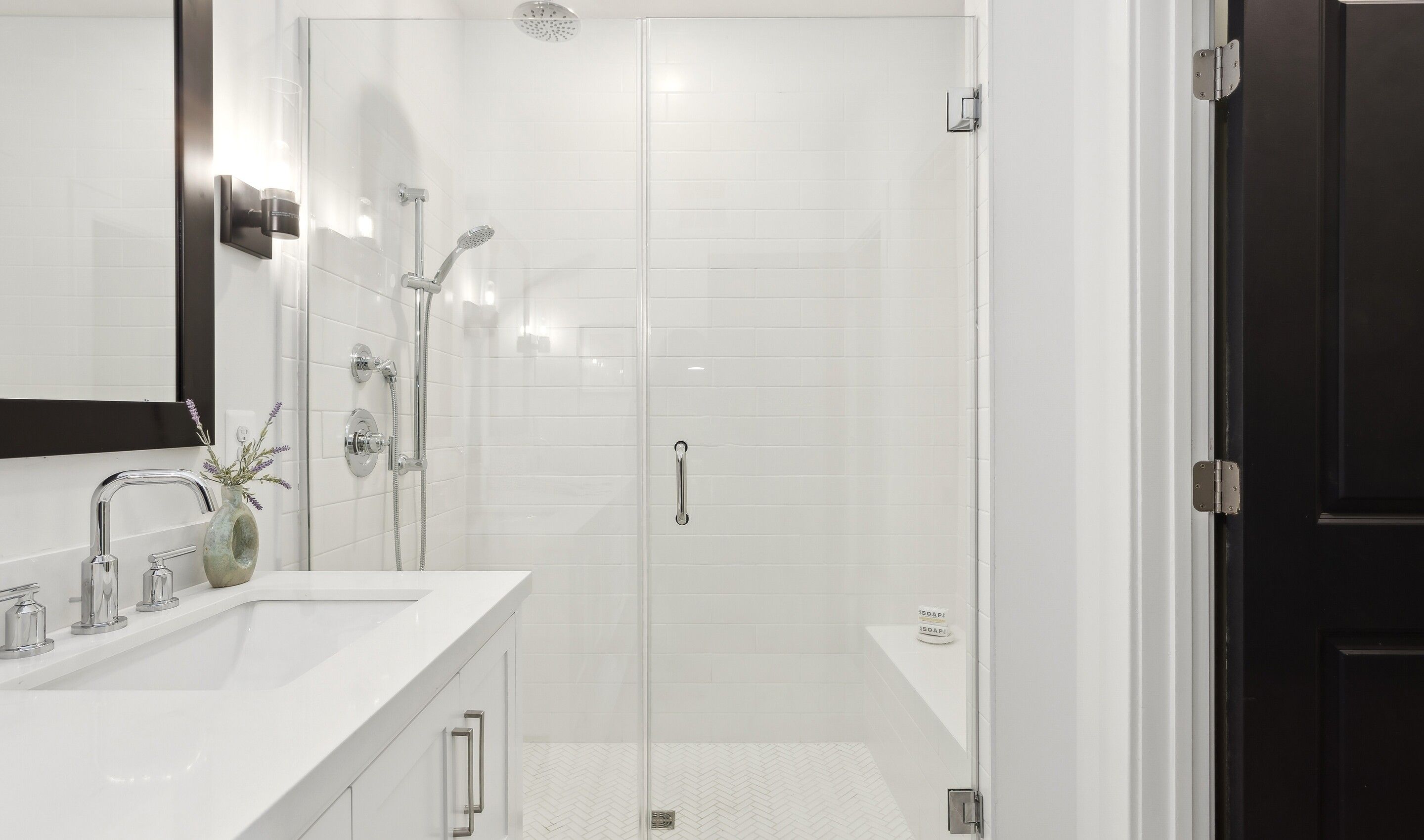 Primary bath with glass-shower enclosure