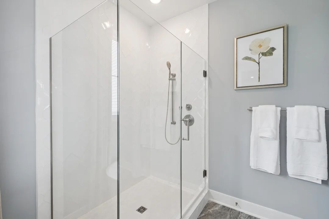 Primary bath with glass shower enclosure