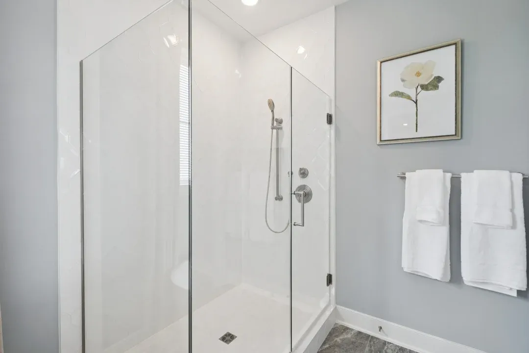 Primary bath with glass shower enclosure