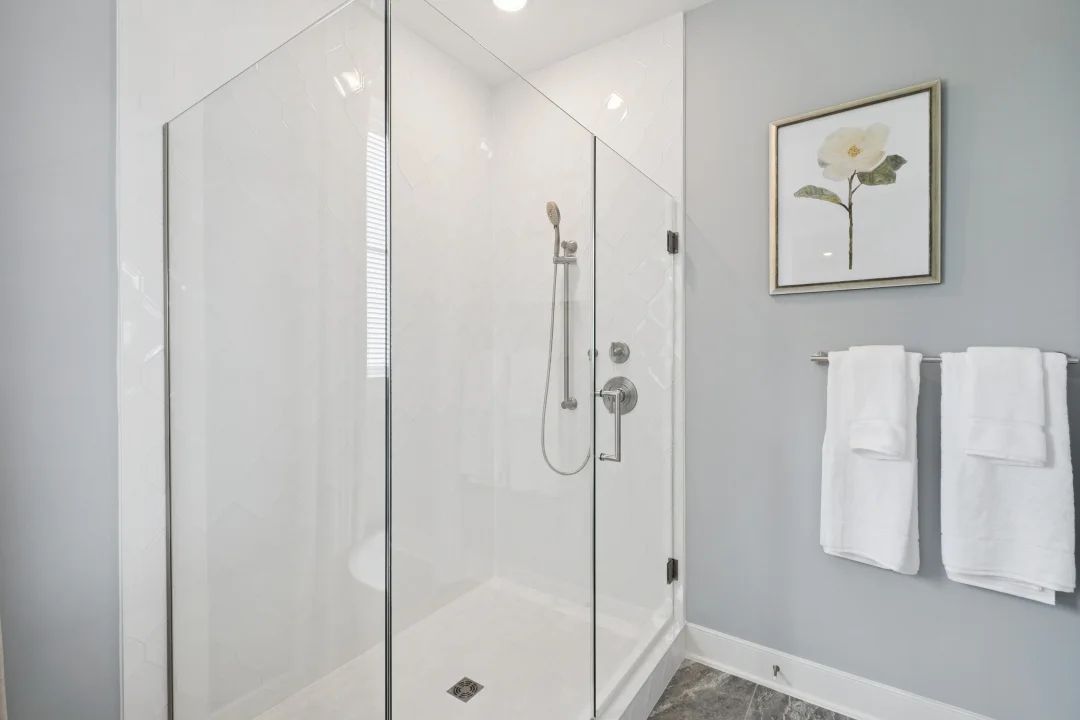 Primary bath with glass shower enclosure