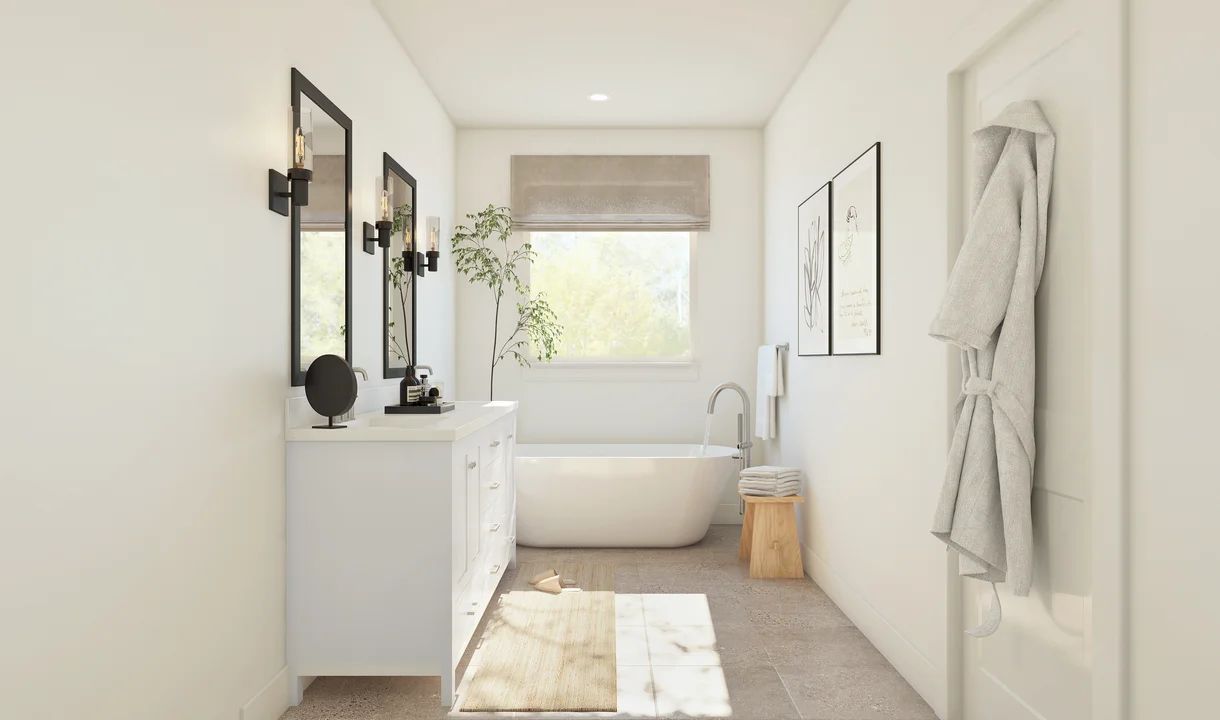 Primary bath features freestanding vanity with dual sinks