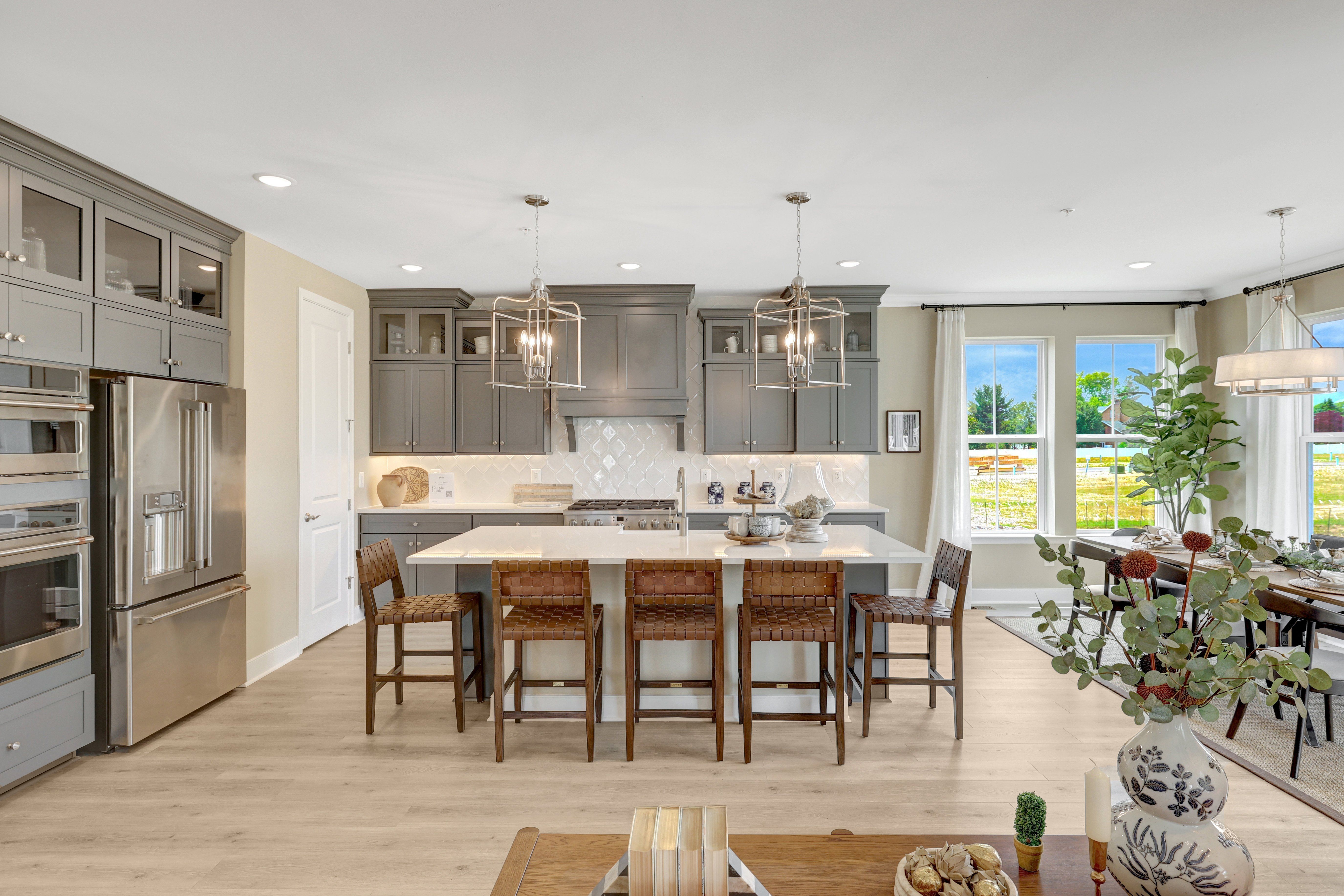 Kitchen with Greyhound cabinets and upper glass cabinetry