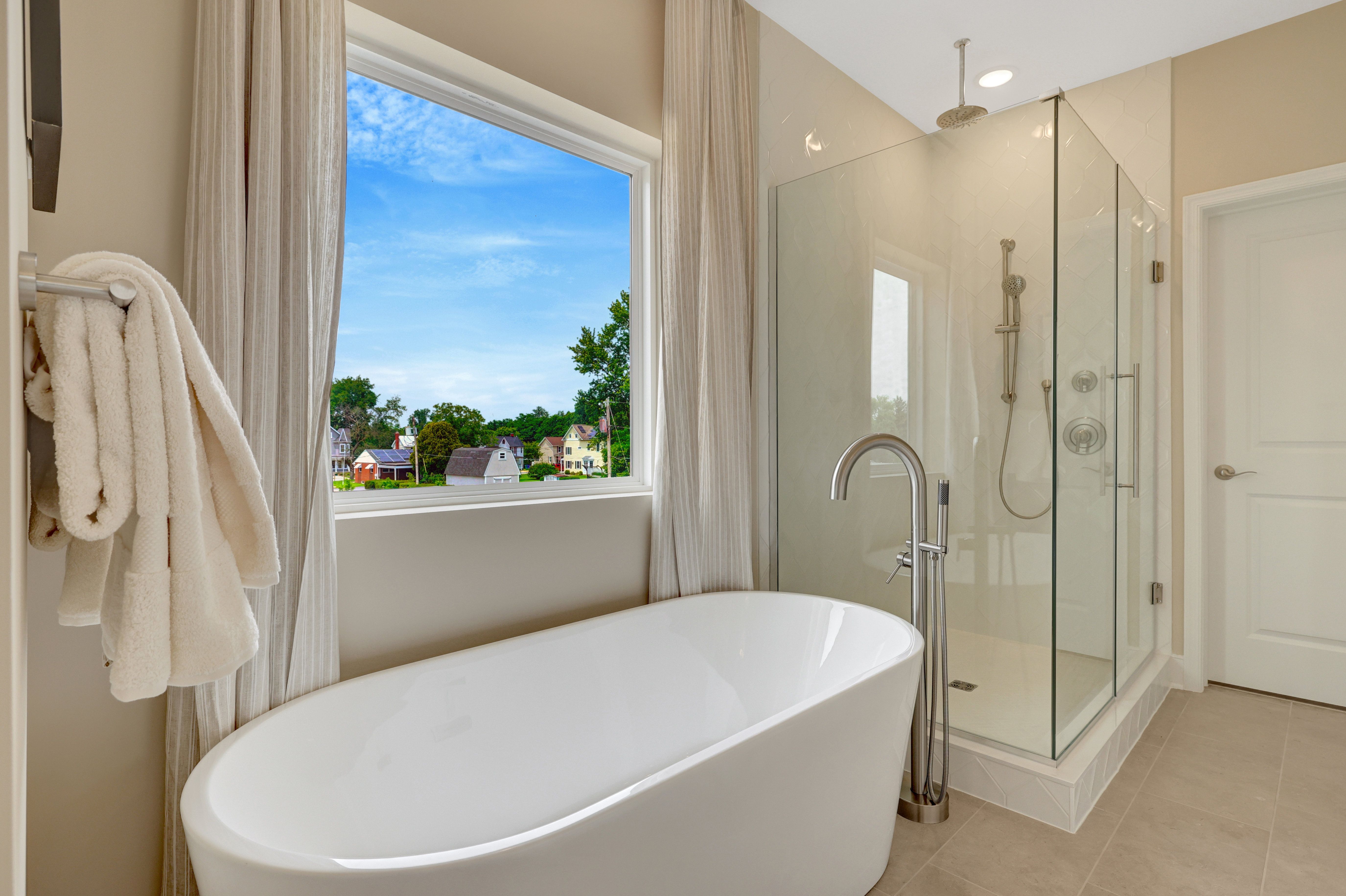 Primary bath with glass shower enclosure