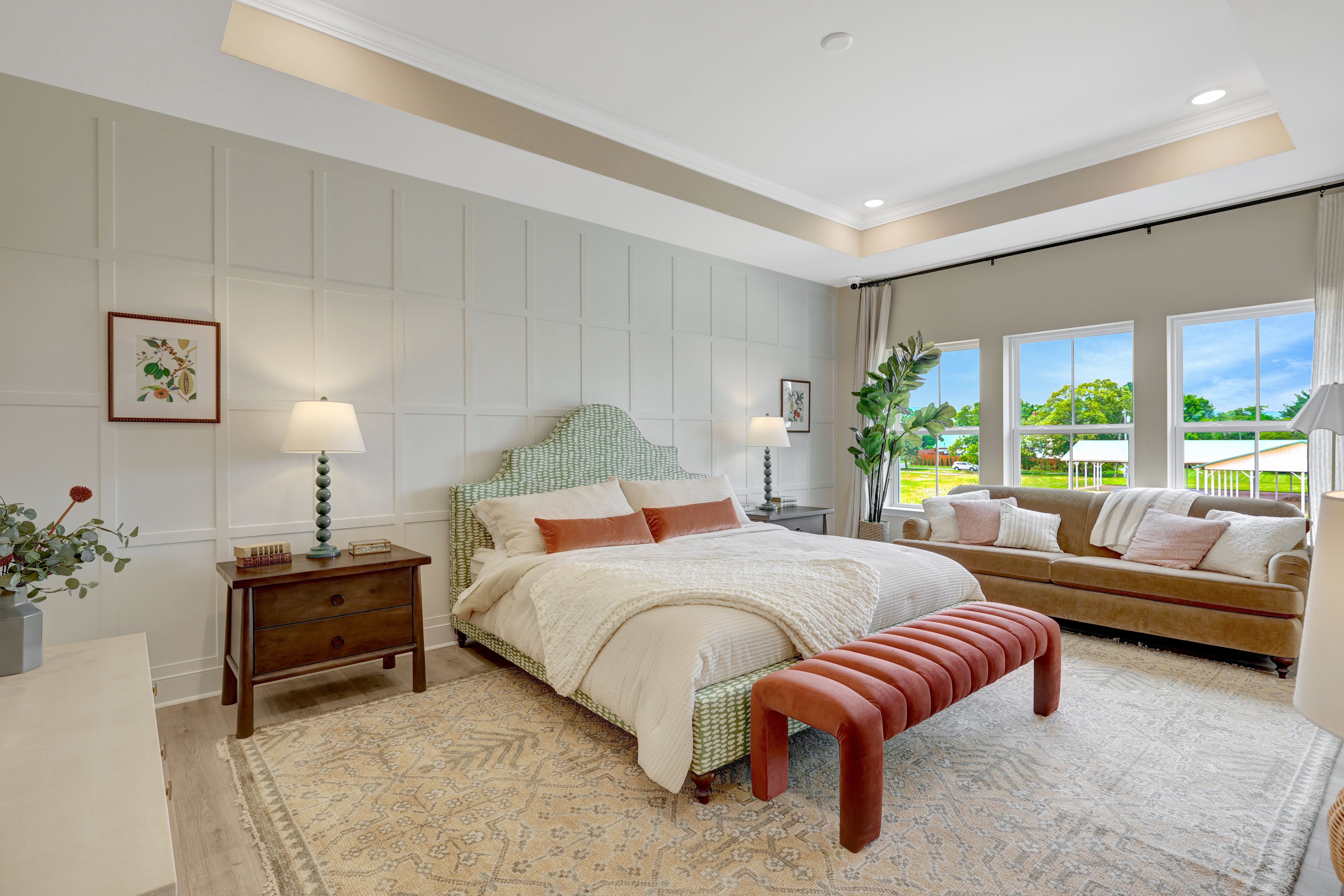 Primary suite with decorative feature wall