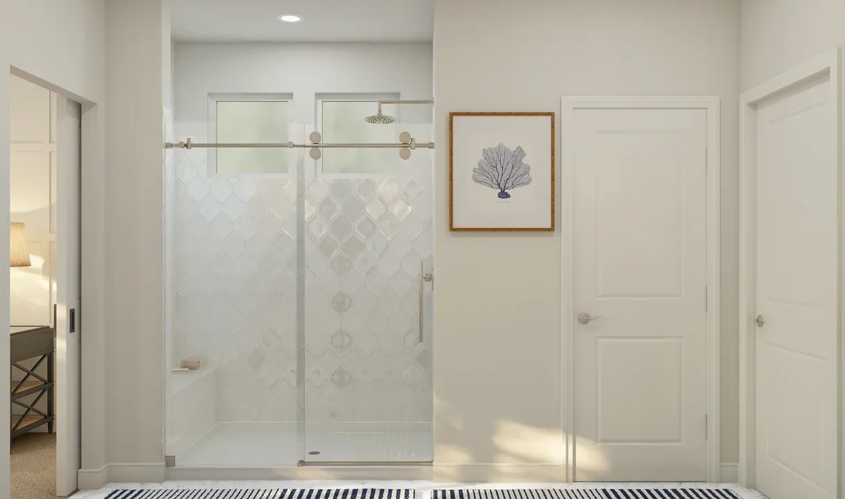 Primary bath with glass shower enclosure