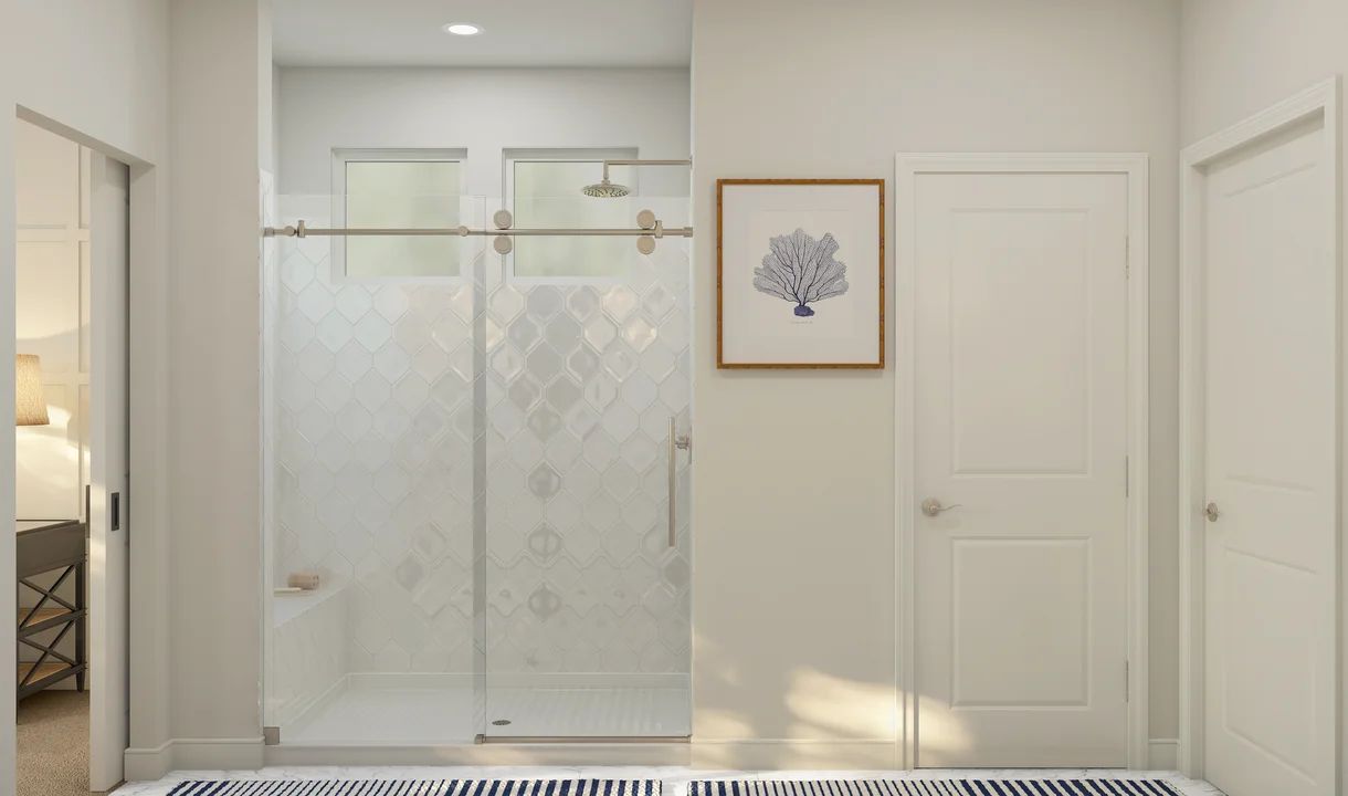 Primary bath with glass shower enclosure