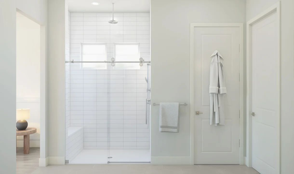 Primary bath with glass shower enclosure
