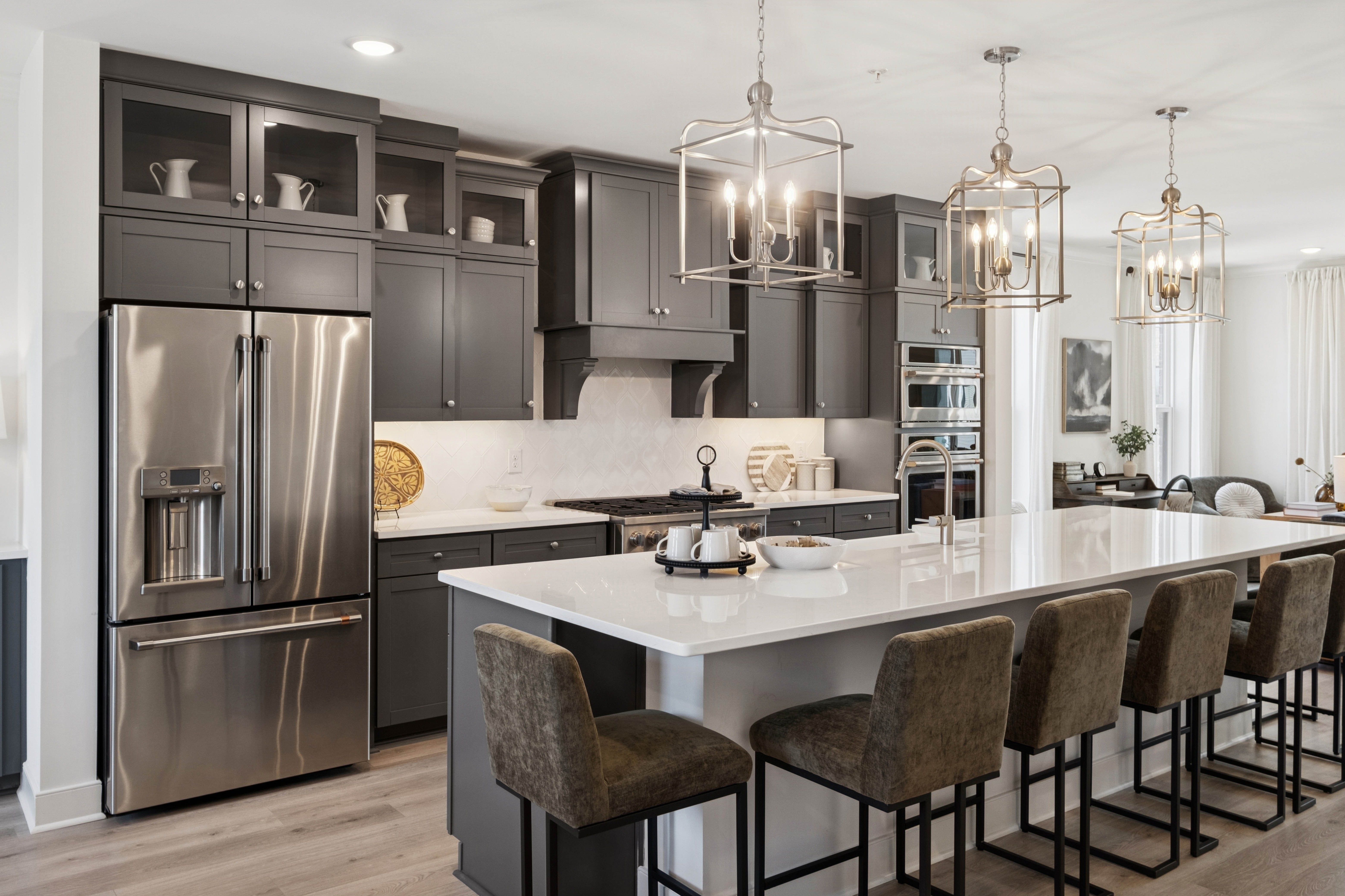 Kitchen with quartz countertops and glass-upper cabinets