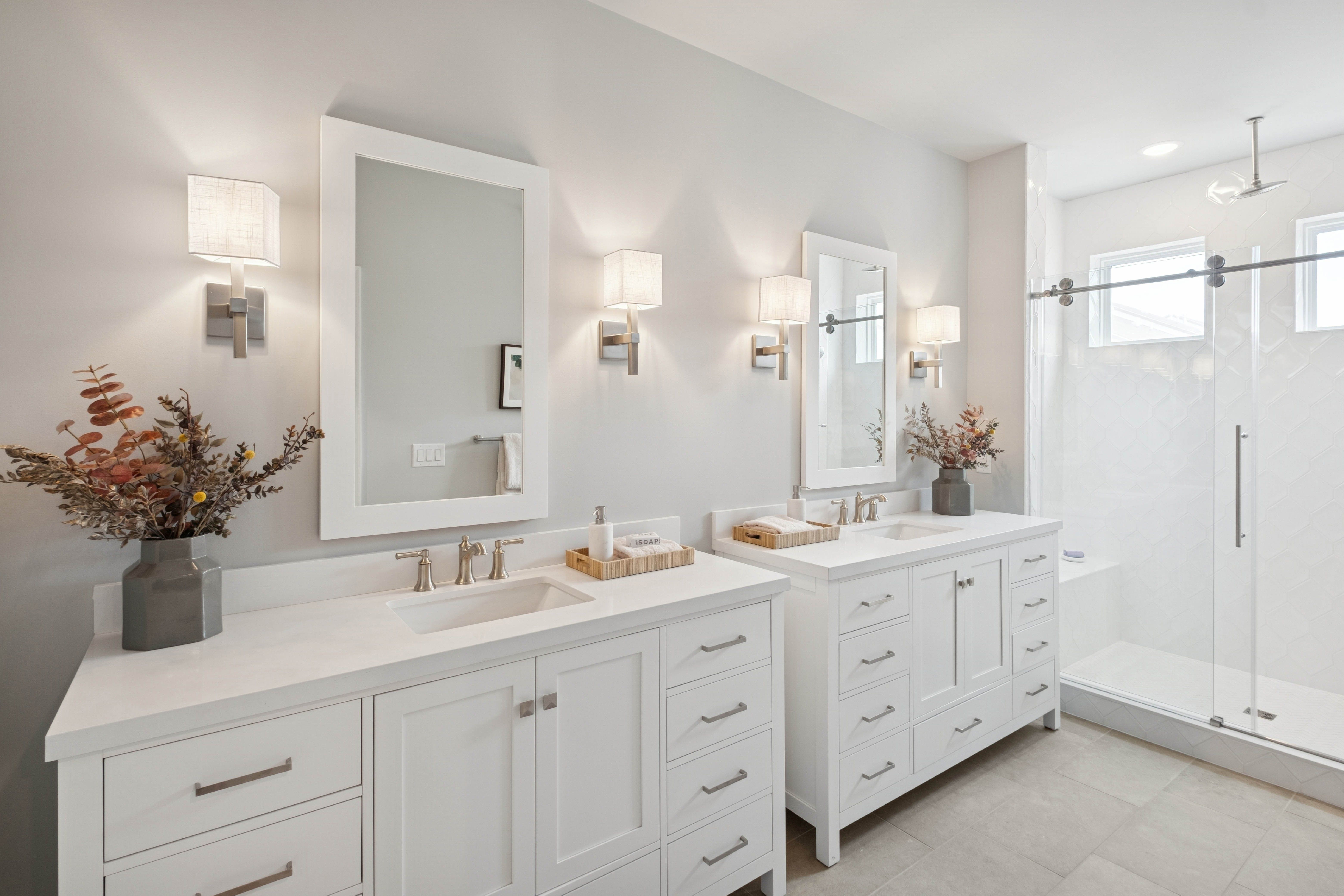 Primary bath with dual freestanding vanities
