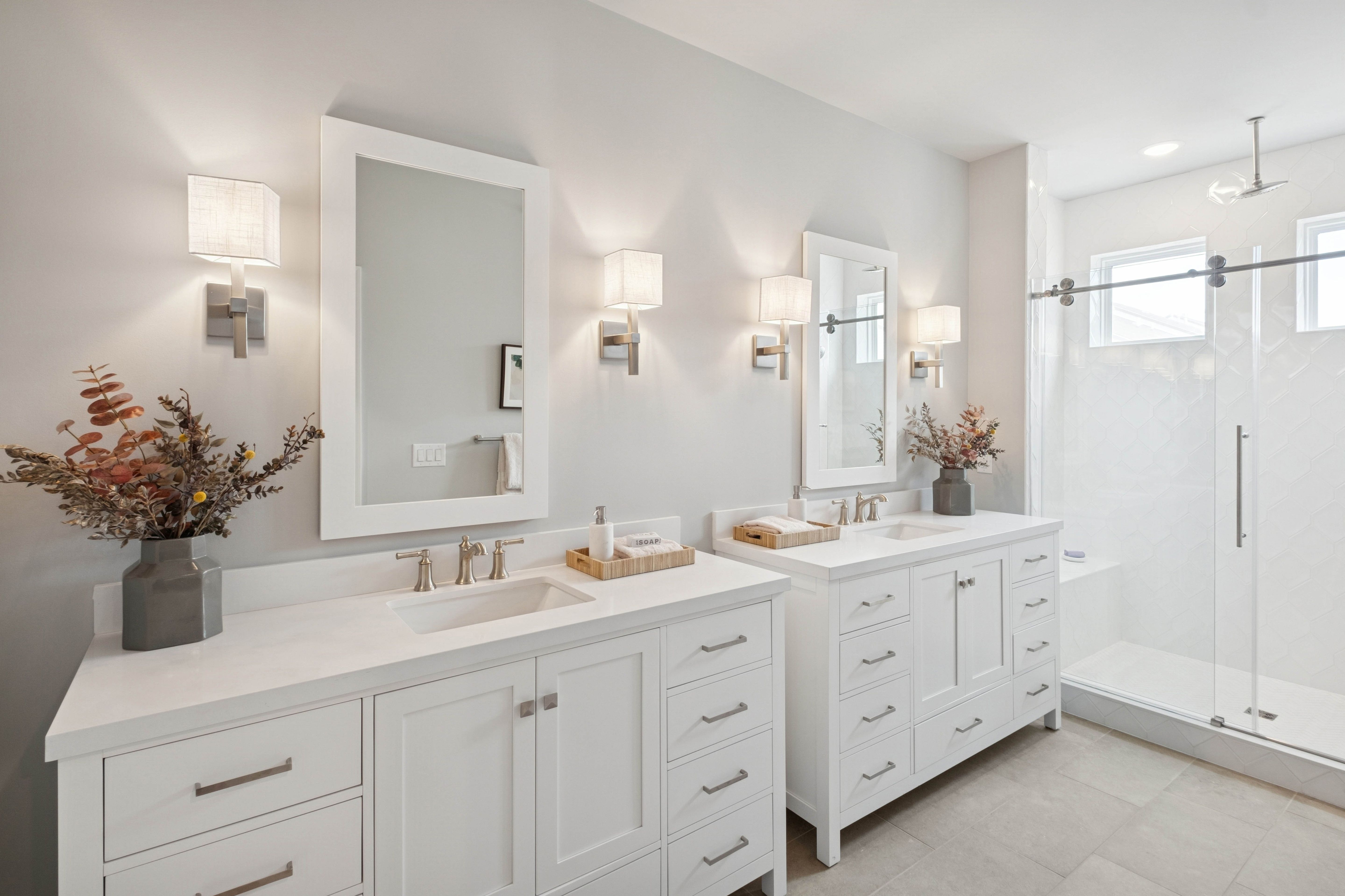 Primary bath with dual freestanding vanities