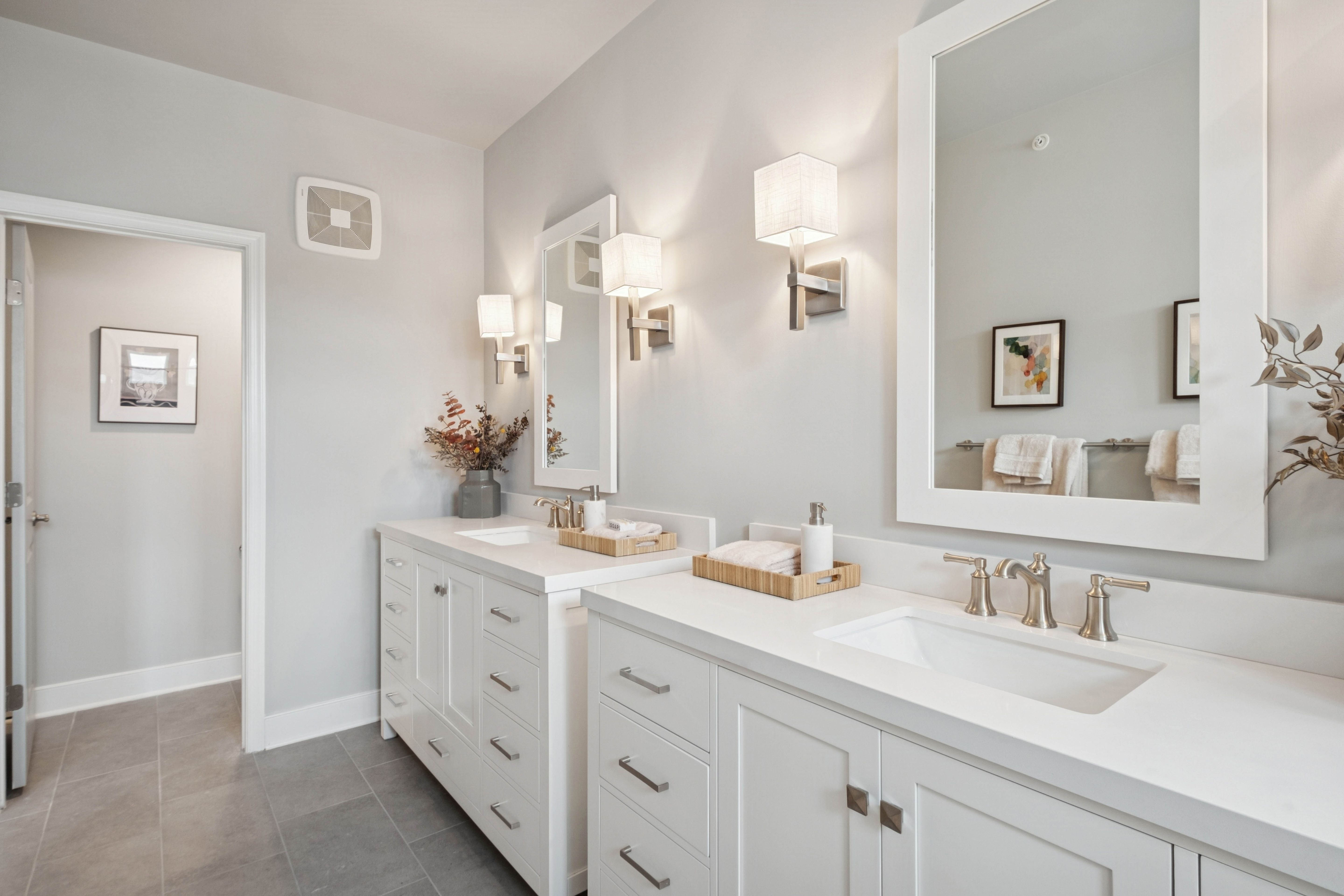 Brushed satin nickel hardware in primary bath