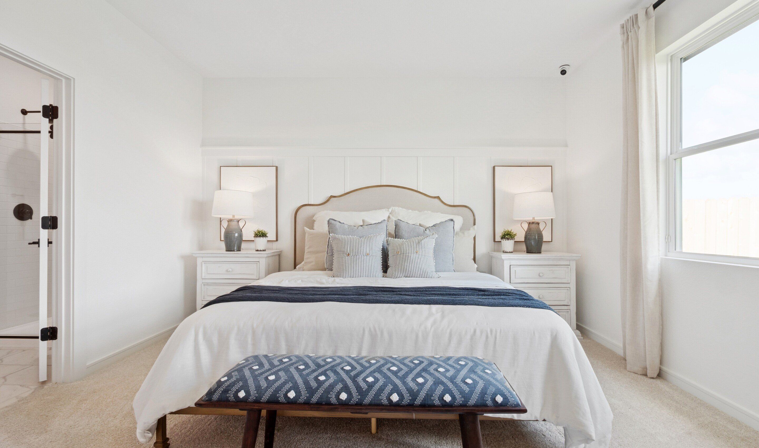 Primary suite with decorated feature wall