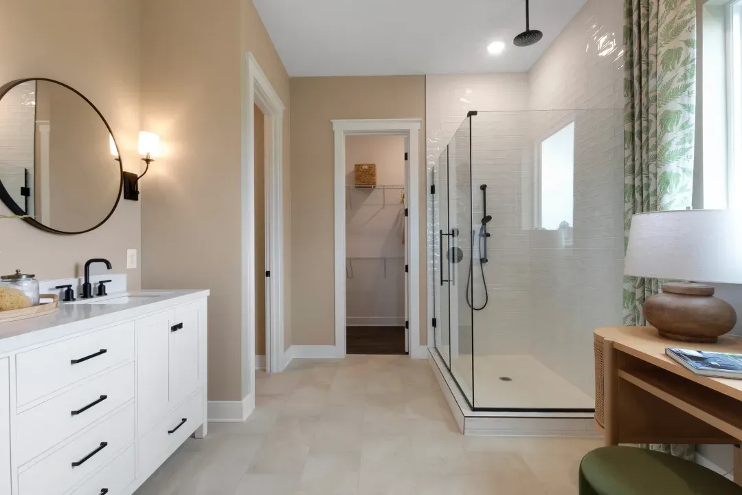 Primary bath with glass shower enclosure