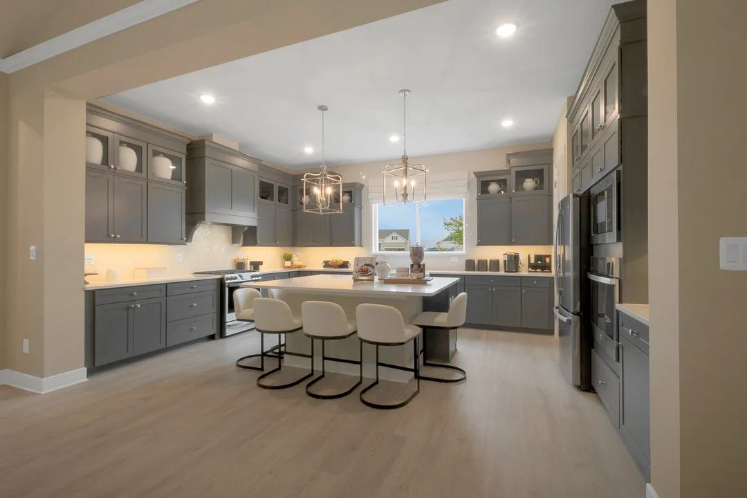 Kitchen with quartz island countertops