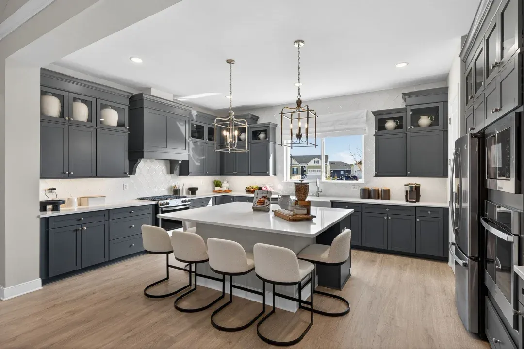 Kitchen with quartz island countertops