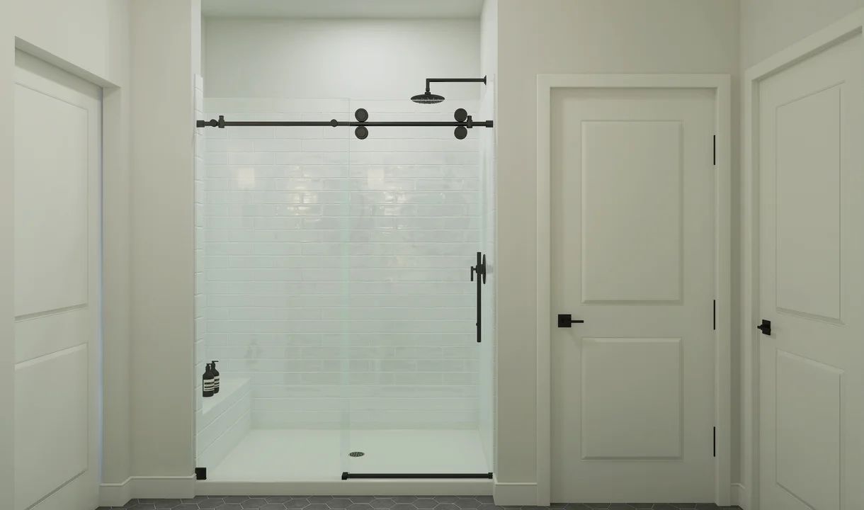 Primary bath with glass shower enclosure