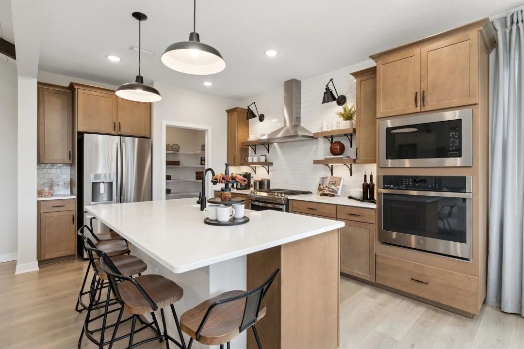 Kitchen with matte black hardware and floating shelves