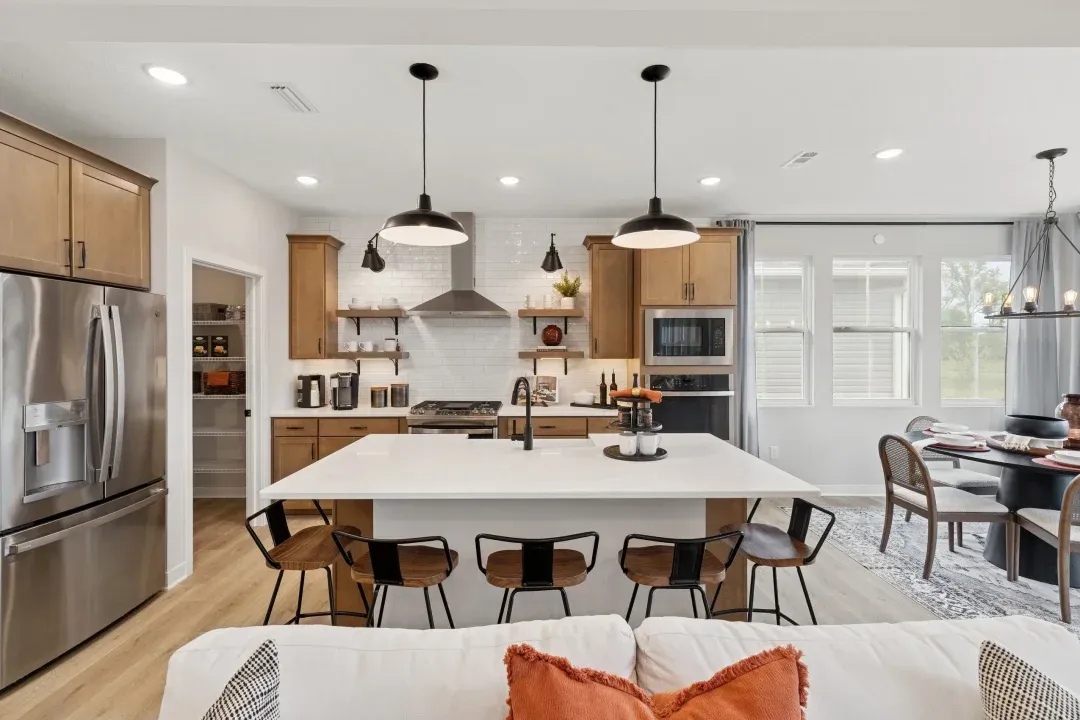 Kitchen with quartz island and countertops