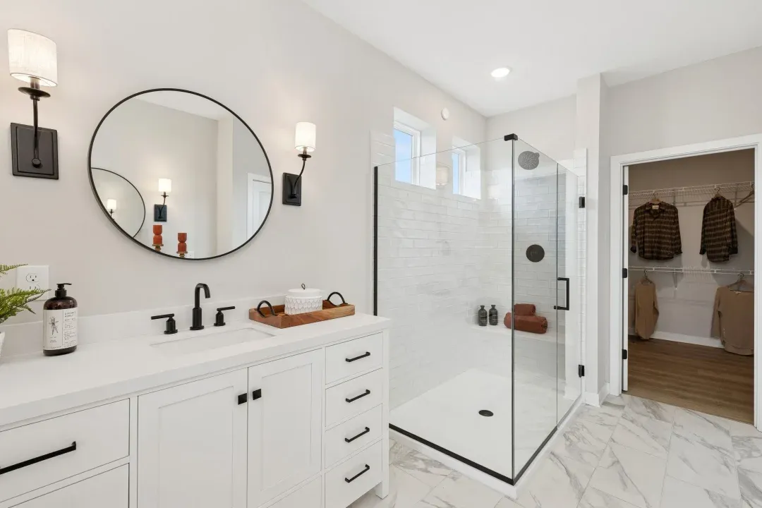 Primary bath with glass shower enclosure