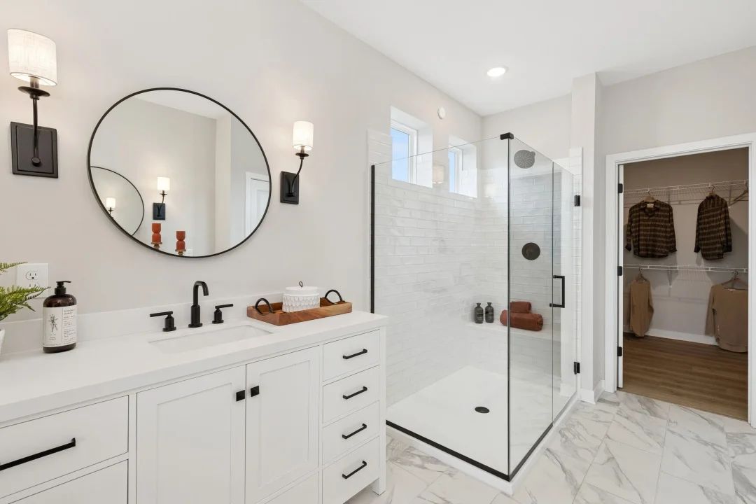 Primary bath with glass shower enclosure