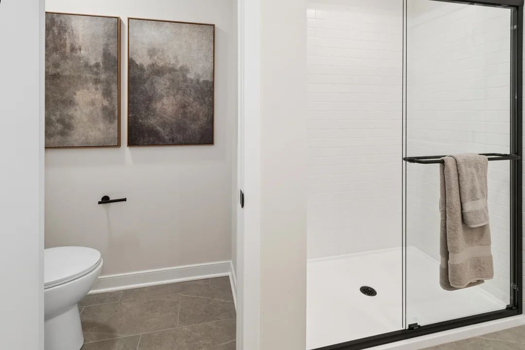 Primary bath with glass shower enclosure