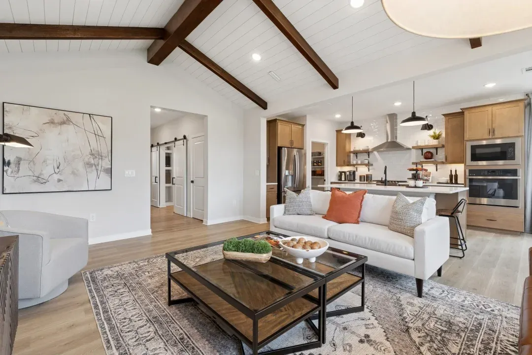 Great room with stained ceiling beams