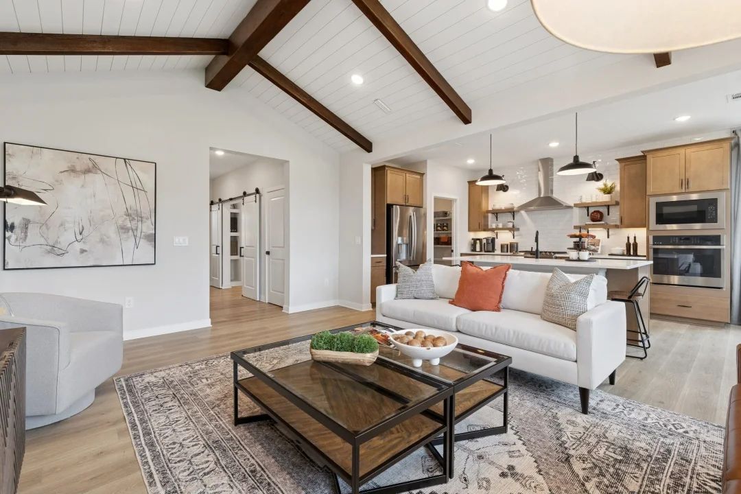 Great room with stained ceiling beams