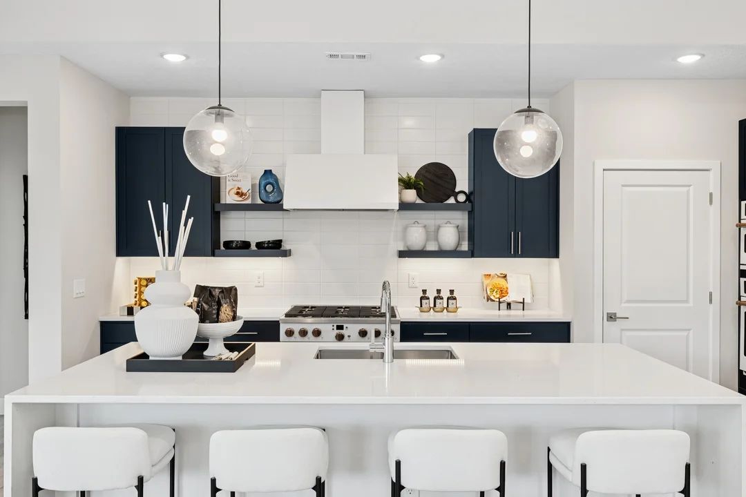 Kitchen with quartz island and countertops