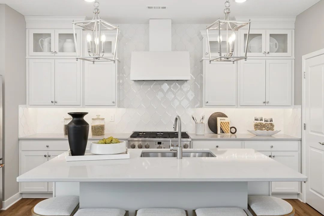 Kitchen with quartz island countertops