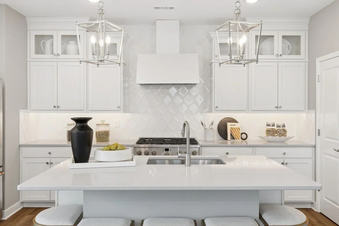 Kitchen with quartz island countertops