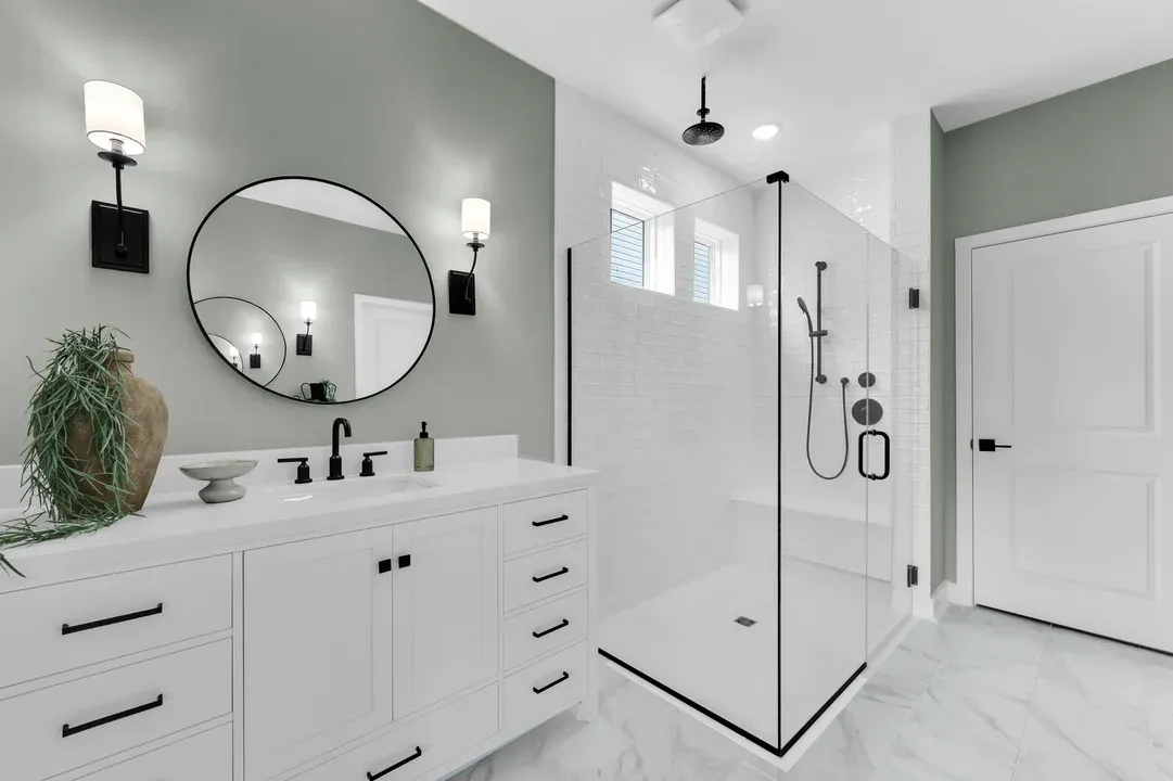 Primary bath with glass shower enclosure