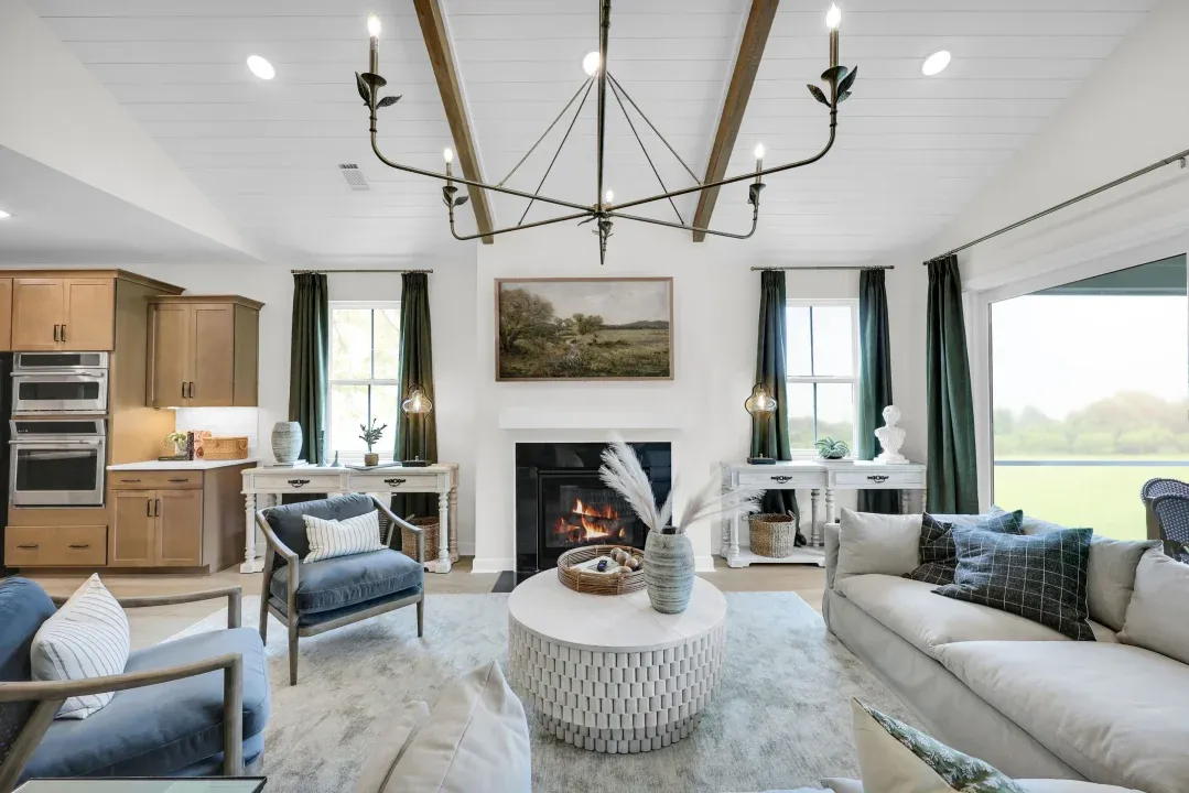Great room with vaulted ceiling and ceiling beams