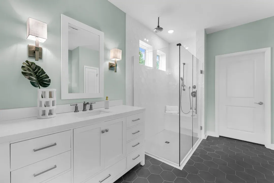 Primary bath with glass shower enclosure