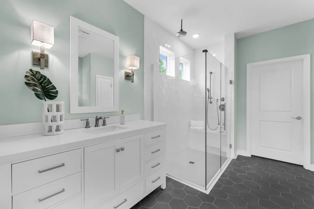 Primary bath with glass shower enclosure