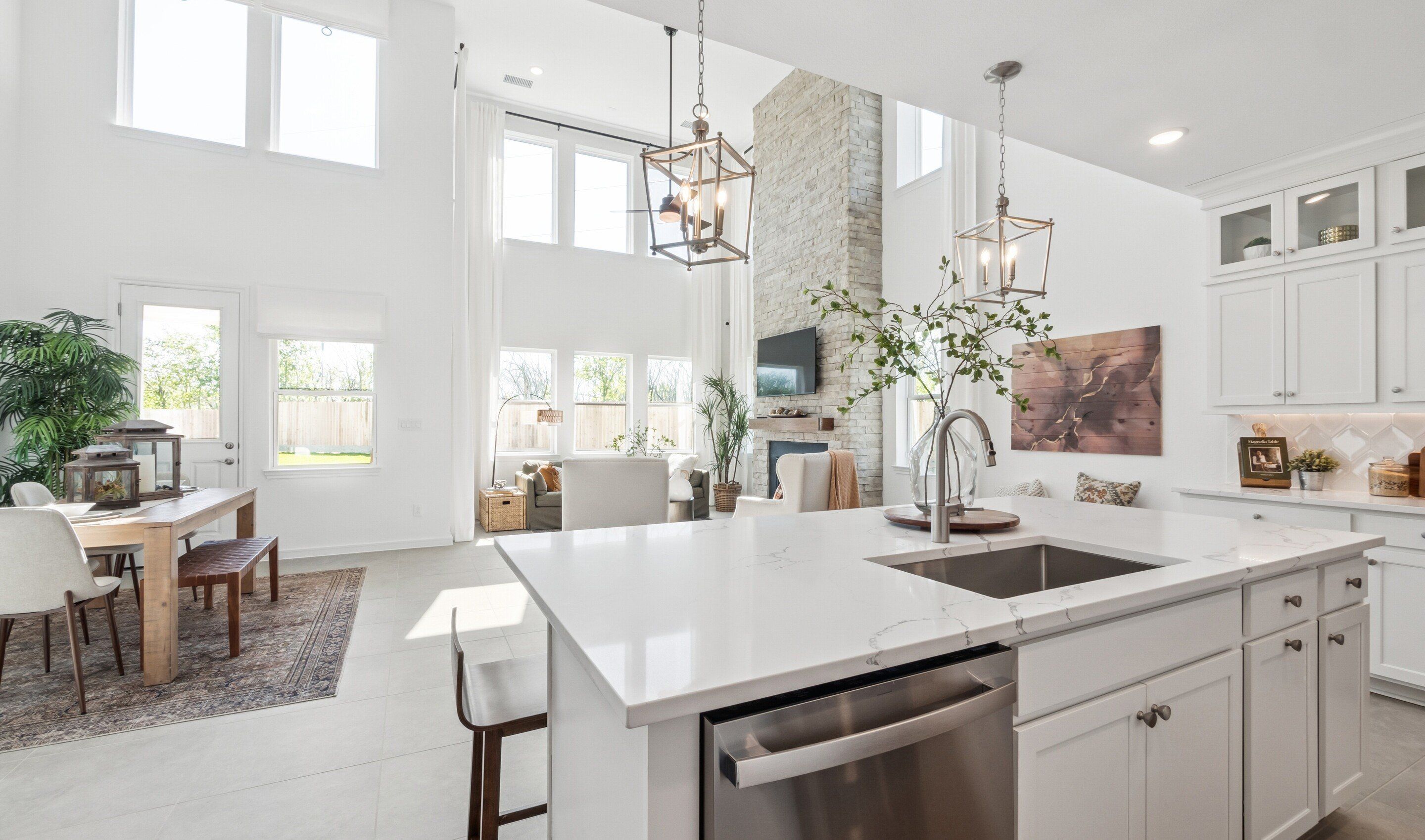Spacious kitchen island overlooking dining area & great room
