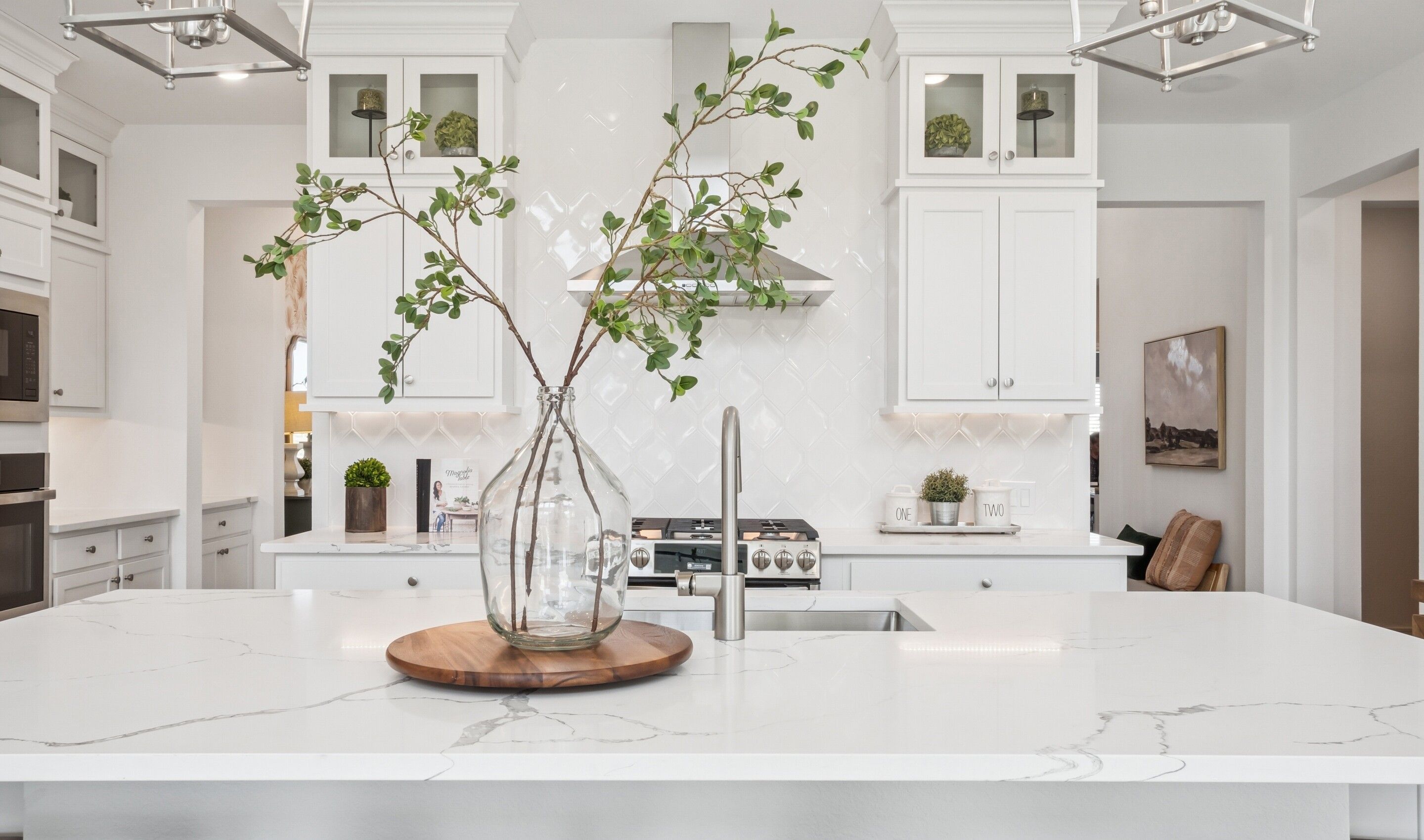 Kitchen with full-height tile backsplash