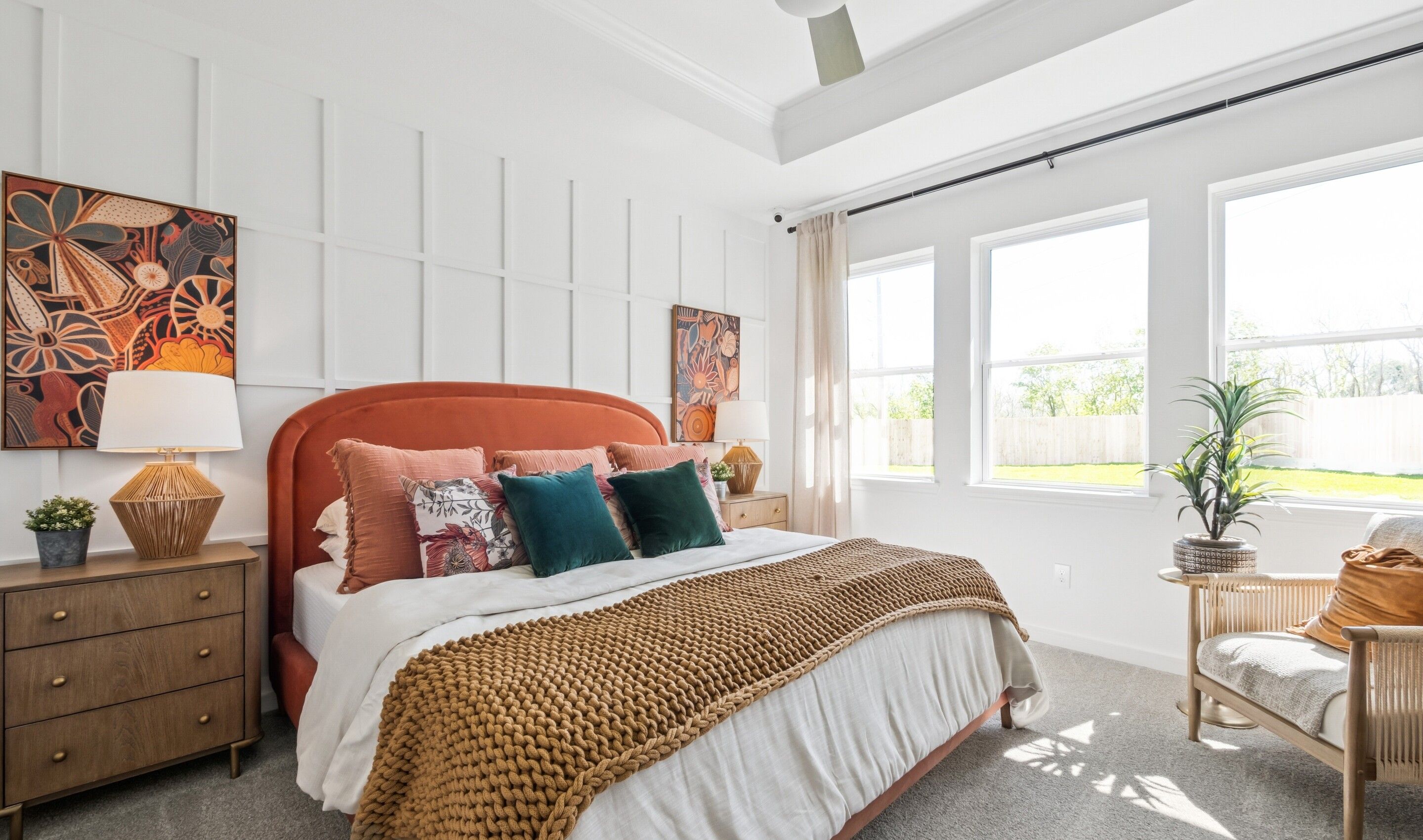 Primary suite with decorative feature wall