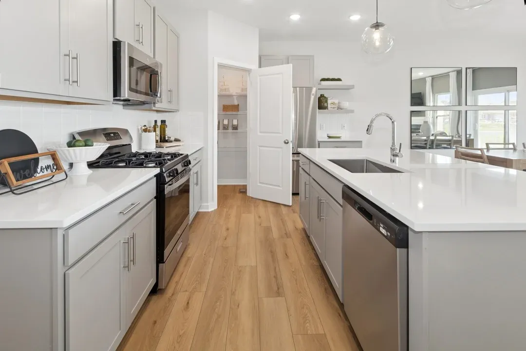 Kitchen with quartz island and countertops