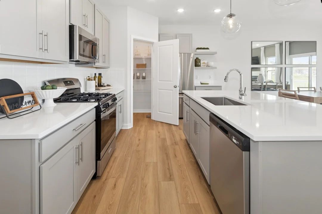 Kitchen with quartz island and countertops