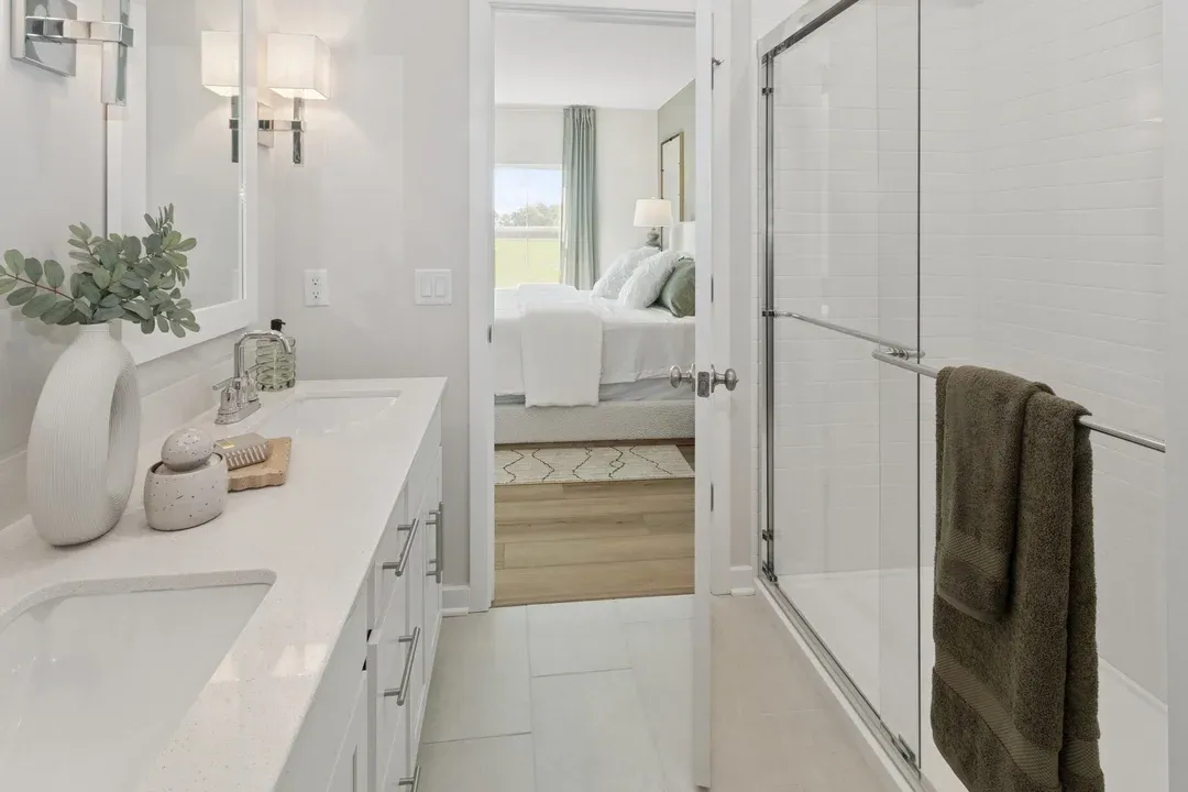 Primary bath with glass shower enclosure